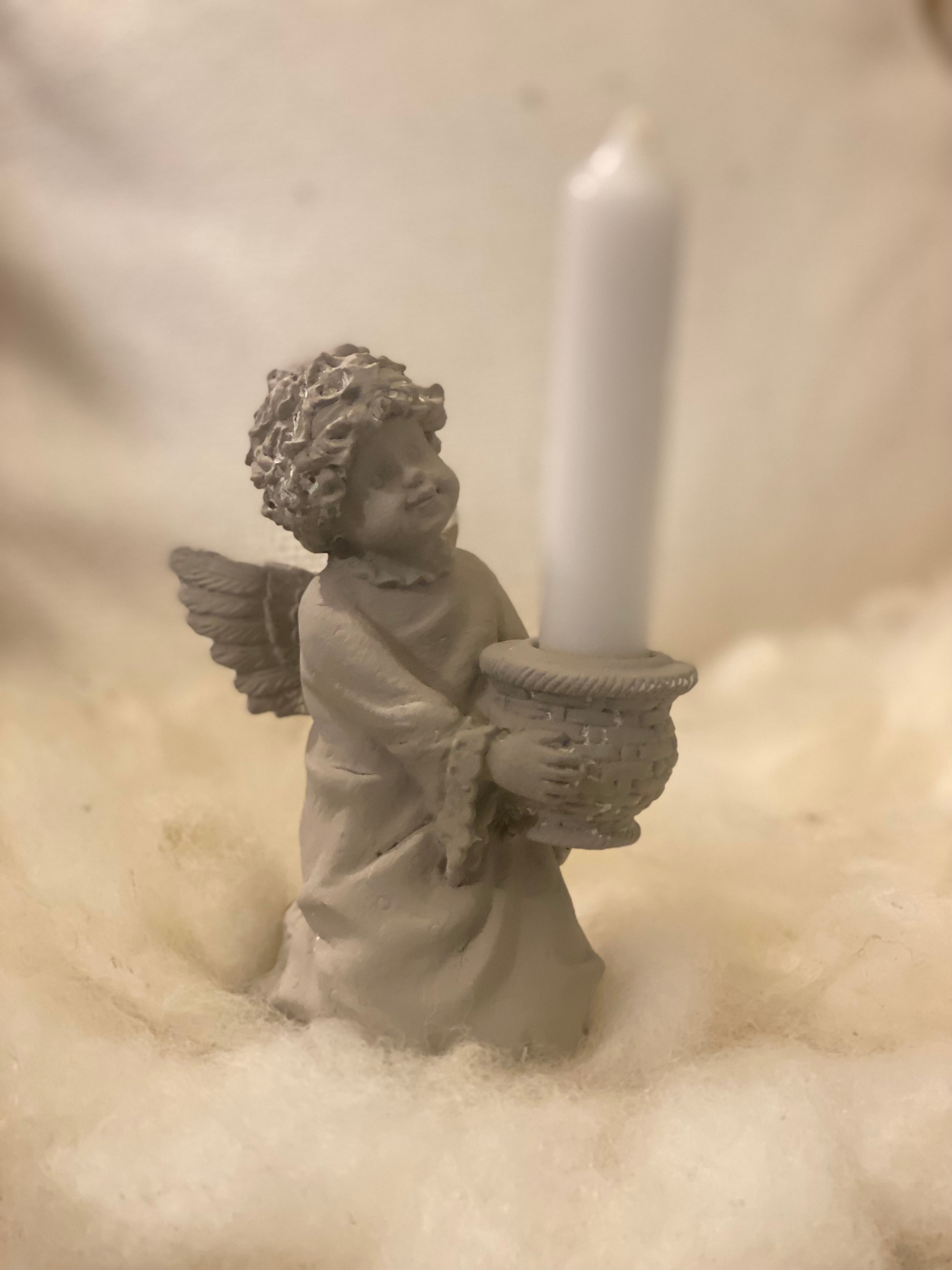 Engel kaarsen houder