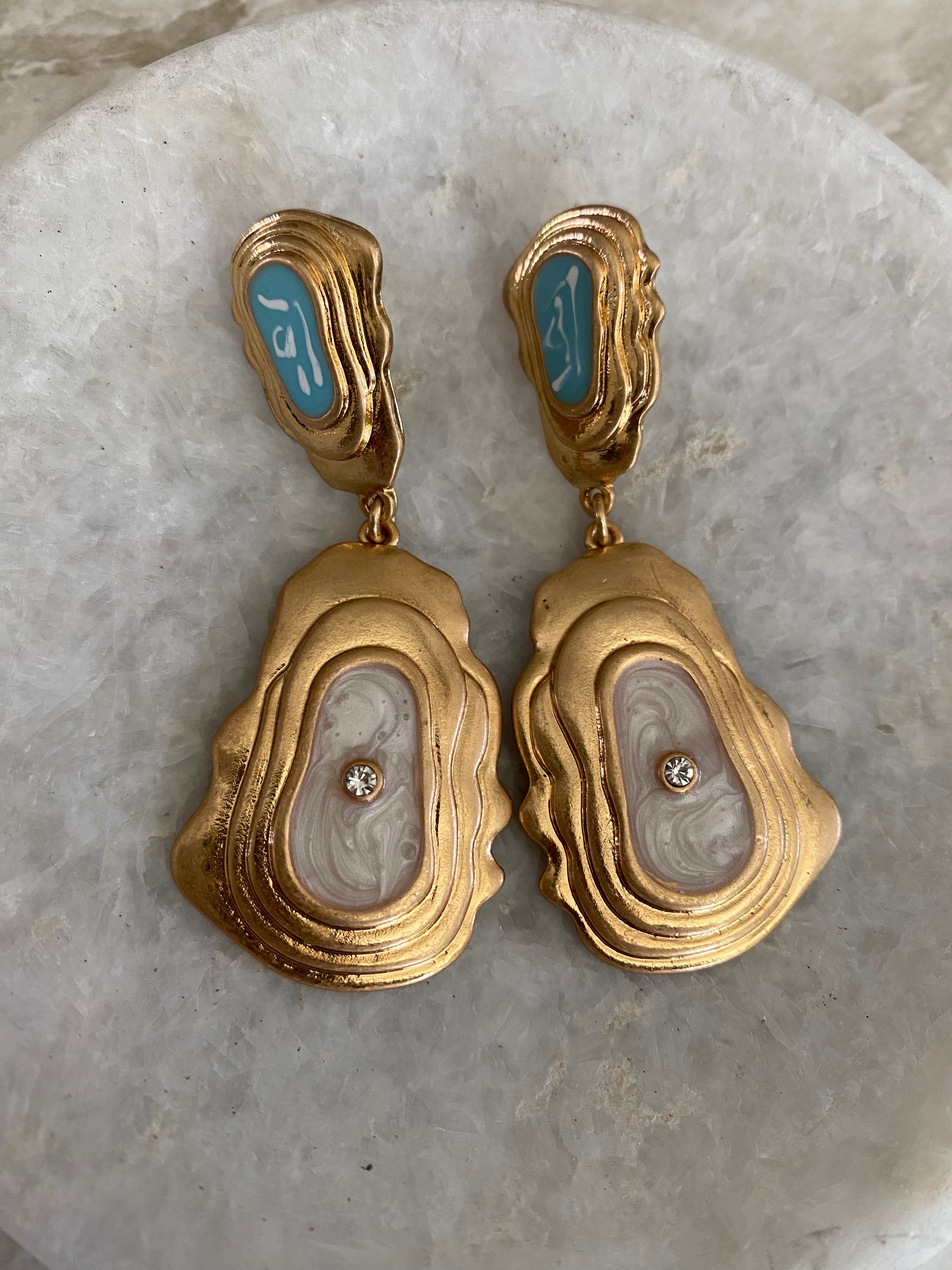 Oorbellen met zachtblauw & goud