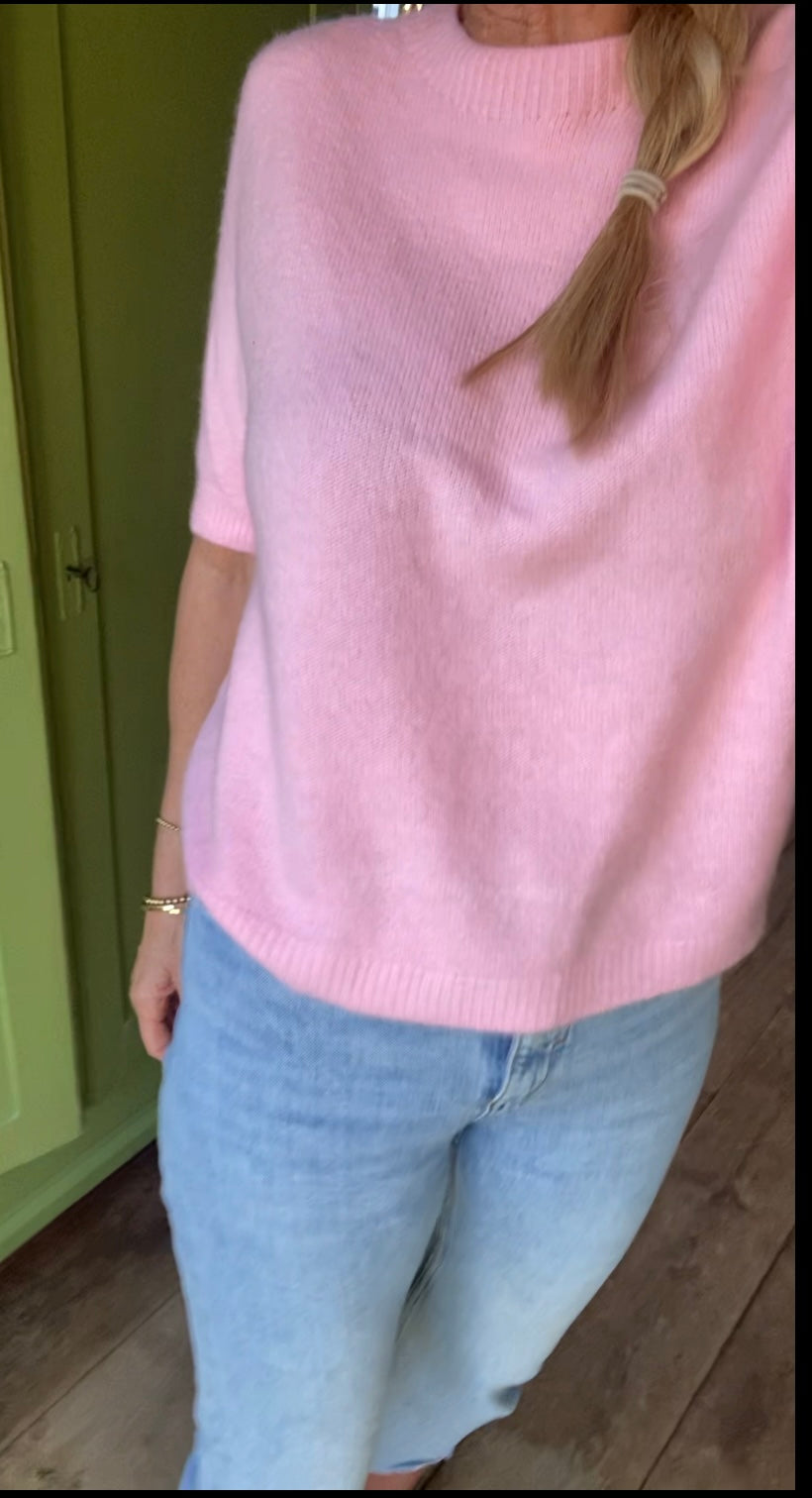 Zacht roze trui