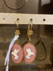 Oud roze hanger met hummingbird