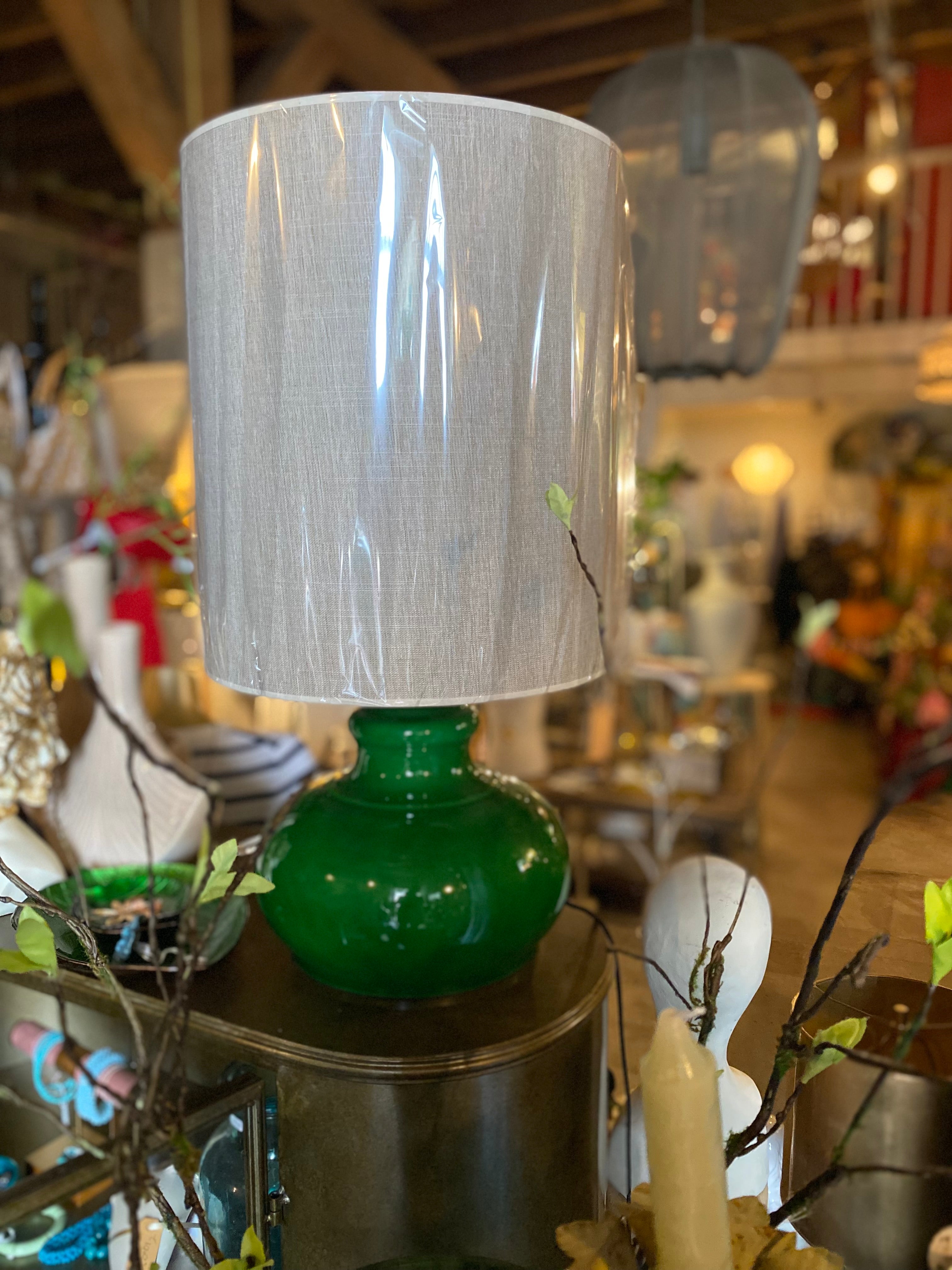 Groene glazen lampvoet.