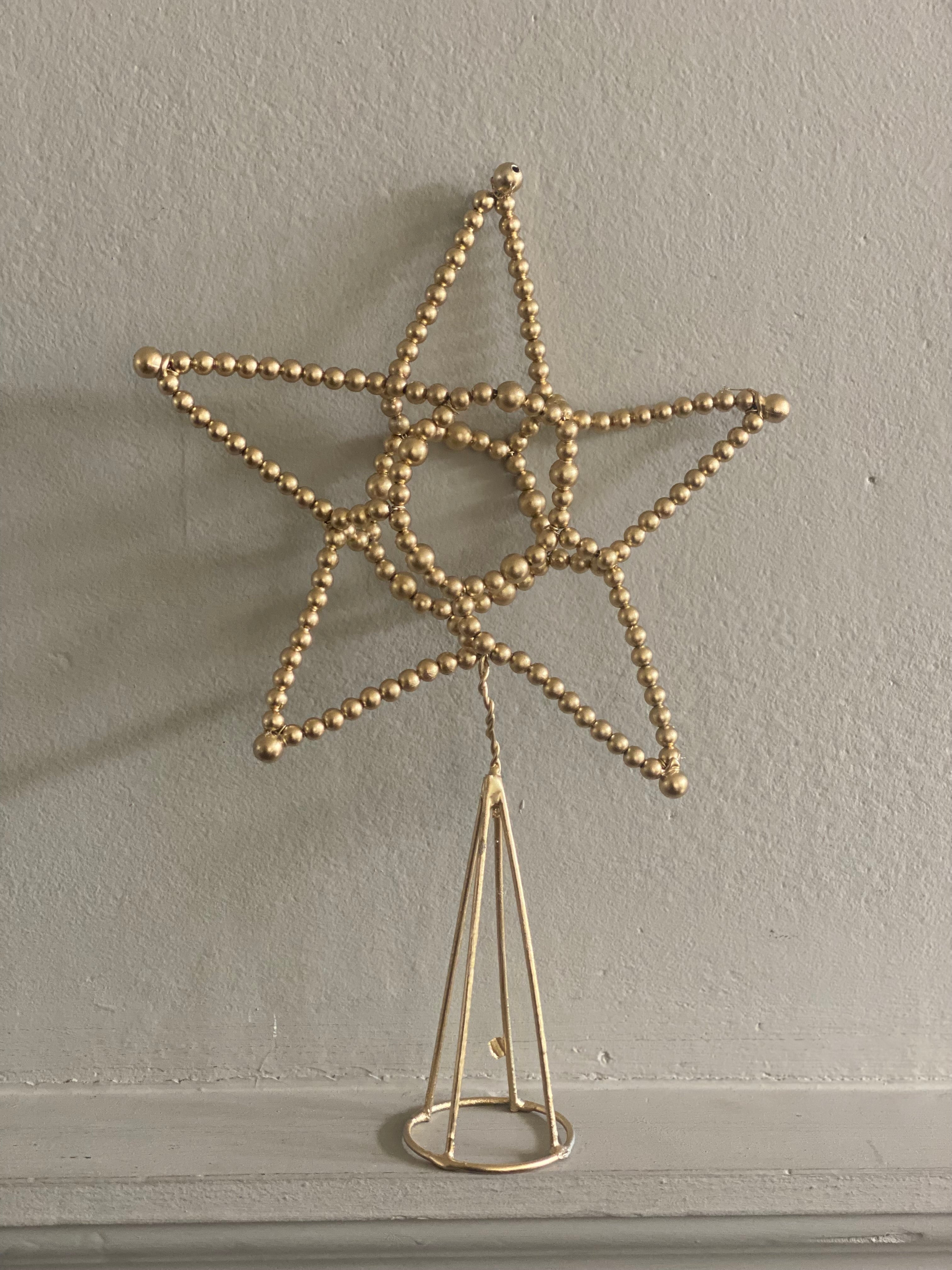 Originele goudkleurige piek